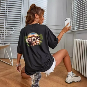 Women's black oversized cotton T-shirt with a colorful dog portrait print on the back