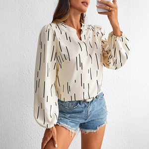 Elegant V-neck blouse with vertical stripes and lantern sleeves in cream white color