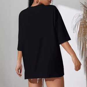 Women's black oversized T-shirt with crew neck and half sleeves, relaxed casual fit back view