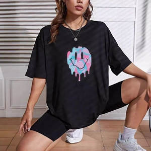 Detail of loose black sports set featuring a colorful marble melting smiley face print