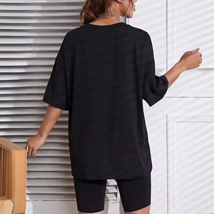 Women's black oversized smiley print t-shirt and cycling shorts two-piece casual set