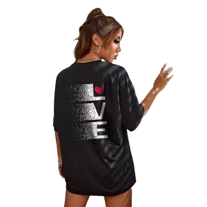 Women's black oversized T-shirt featuring back 'LOVE' print and red heart detail