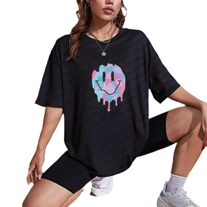 Women's casual oversized black T-shirt with colorful smiley face and cycling shorts