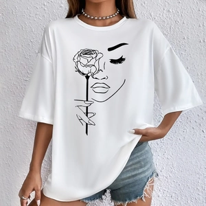 Detailed view of women's white oversized t-shirt with black rose and face line art