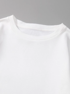 Detailed close-up of the ribbed crew neck collar and reinforced stitching on a white sweatshirt