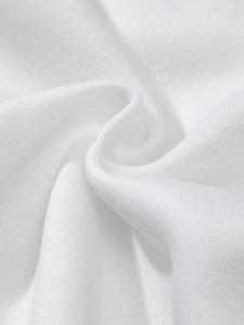 Detailed macro shot of premium white 220g knitted cotton fabric texture and fiber