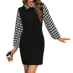 Elegant women's black fitted dress with houndstooth lantern sleeves and mini skirt length