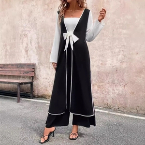 Women's chic black and white contrast long vest with bow and wide leg pants set