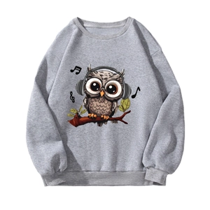 Women's grey crewneck sweatshirt featuring a cartoon owl with headphones print