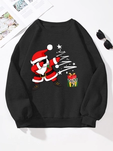 Detailed flat lay of black crewneck sweatshirt with festive dabbing Santa Claus print