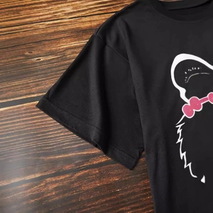 Black cotton t-shirt with cute cartoon tiger and pink bow print on wooden floor