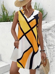 Detail of elegant V-neck sleeveless dress with vibrant geometric patterns in summer sun
