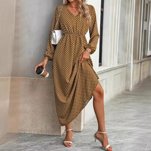 Women's V-neck puff sleeve maxi dress with white polka dots on brown fabric