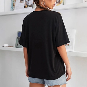 Minimalist black oversized cotton t-shirt for women with relaxed fit and crew neck style