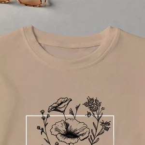 Beige crew neck T-shirt featuring a minimalist black floral line art print for summer