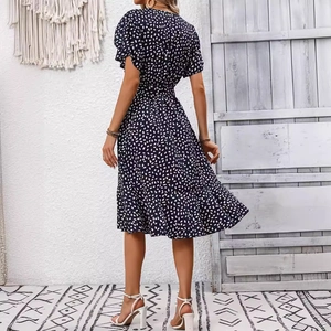 Elegant navy blue floral summer dress with ruffled hem and slim waist for women