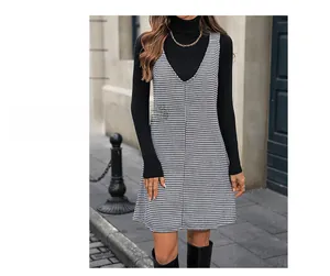 Close-up of classic black and white houndstooth weave on a V-neck sleeveless dress
