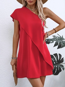 Detail of red one shoulder dress with layered diagonal wrap design and sleeveless cut
