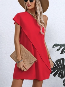 Detail of red one-shoulder dress with irregular layered ruffles for summer vacation