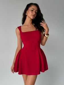 Detail view of red square-neck sleeveless mini dress with elegant A-line pleated skirt