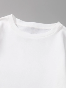 Detail of ribbed neckline and soft fleece lining on white cotton crewneck sweatshirt