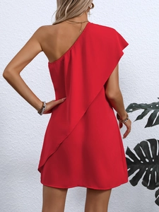 Detailed back view of a red one-shoulder dress featuring elegant ruffle layers and sleek cut