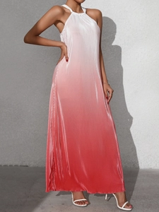 Close-up of pleated gradient fabric on halter dress transitioning from white to pink