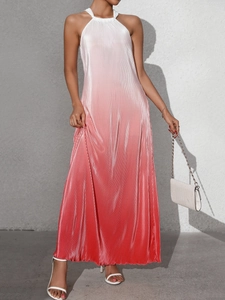Detail of gradient halter maxi dress with pleated texture and silk-like satin finish