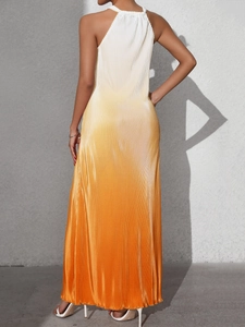 Detail of backless halter dress showing gradient ombre pleats and slimming fit silhouette