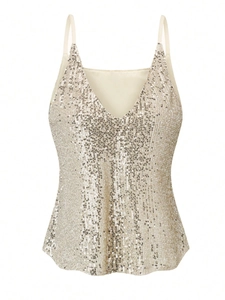 Detail of champagne gold sequined tank top featuring fine straps and V-neckline finish