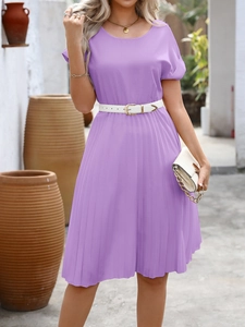 Detail of purple pleated A-line dress featuring white leather belt with gold buckle