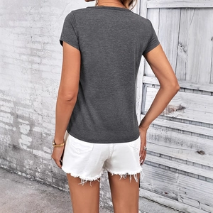 Slim fit dark grey crew neck T-shirt for women shown from the back against a white wall