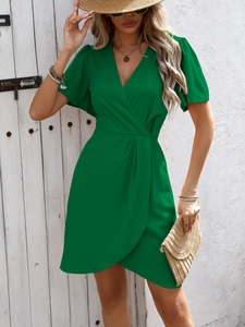 Detail of elegant dark green V-neck wrap dress with short sleeves for summer fashion