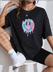 Detailed view of black short-sleeve T-shirt featuring pink and blue melting smiley face
