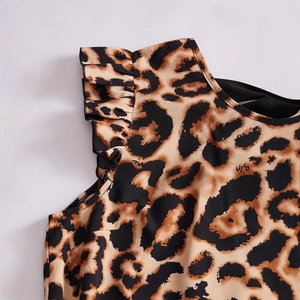 Women's leopard print dress with tie-neck and ruffle sleeves in a stylish A-line cut