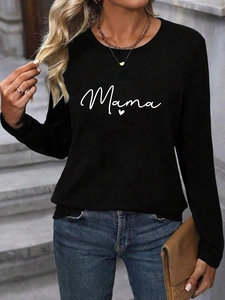 Detail of white Mama script and small heart print on black long sleeve cotton T-shirt