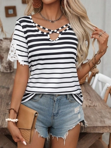 Elegant striped V-neck T-shirt with lace sleeves and blue denim shorts for summer fashion