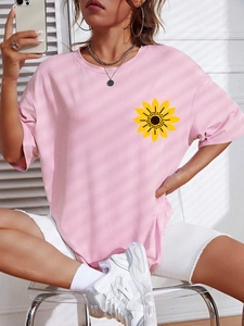 Pink oversized cotton T-shirt with sunflower print and classic round neck for women