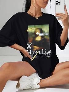 Close-up of black oversized t-shirt featuring pixelated Mona Lisa art and street style print