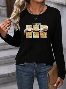 Detail of artistic sunflower and hands graphic print on black long sleeve casual t-shirt