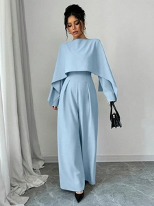 Elegant light blue long sleeve wide leg jumpsuit with waist tie for women fashion