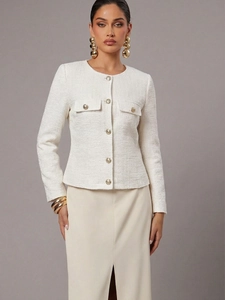 Detailed view of white tweed jacket featuring elegant gold buttons and woven texture