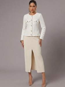 Detail of white tweed jacket with gold buttons and beige slit midi skirt set