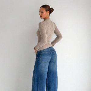 Slim fit oatmeal knit long sleeve top with ribbed texture and high waist jeans