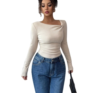 Slim fit beige ribbed knit sweater with asymmetric twisted neckline for women