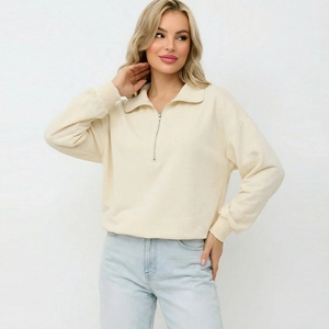 Chic cream long-sleeve quarter-zip sweatshirt with a high collar and ribbed cuffs