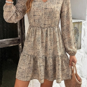 Elegant beige V-neck long sleeve dress with black polka dots and tiered ruffle hemline
