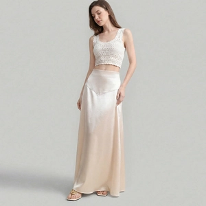 Elegant white crochet top and champagne satin maxi skirt set for women's casual style