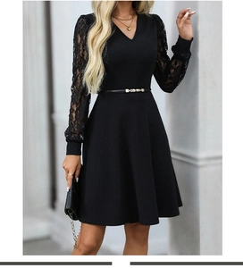 Detailed view of elegant black lace long sleeves and V-neckline on an A-line dress