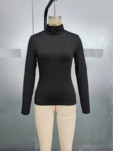 Close-up of black turtle neck long sleeve top with tight fit and smooth fabric texture